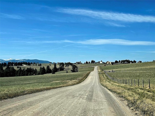 view of street featuring a mountain view and a rural view