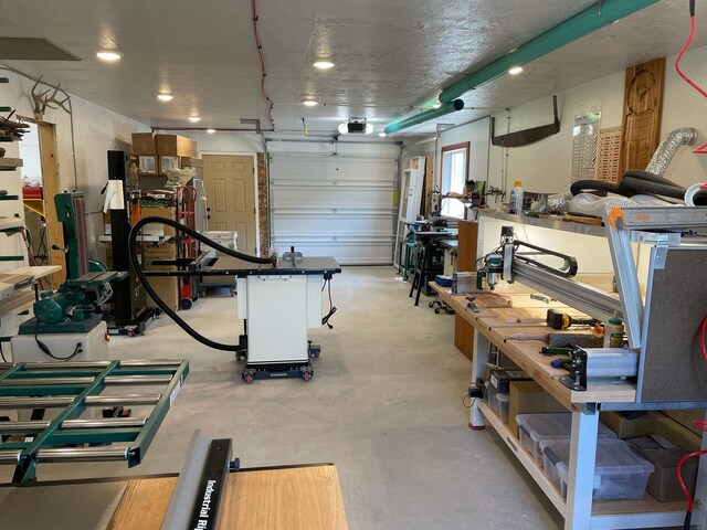 garage with a workshop area
