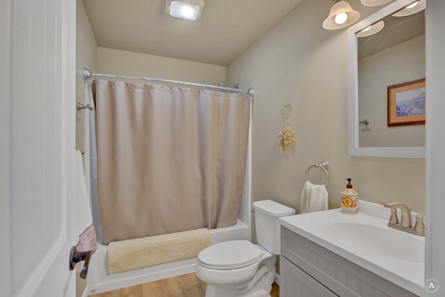 full bath with toilet, shower / bathtub combination with curtain, wood finished floors, and vanity
