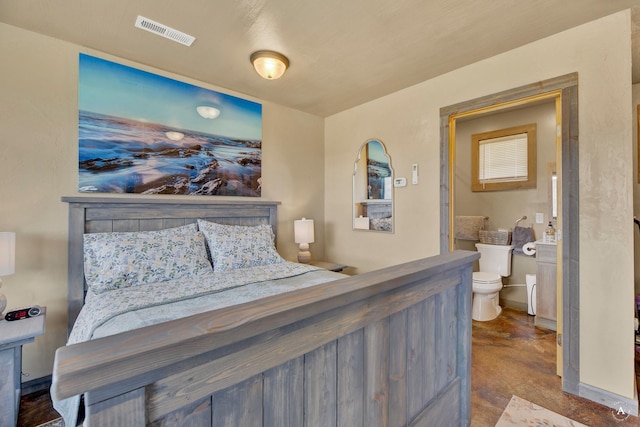 bedroom featuring visible vents