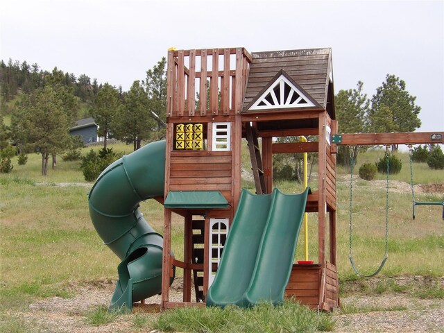 view of playground with a yard