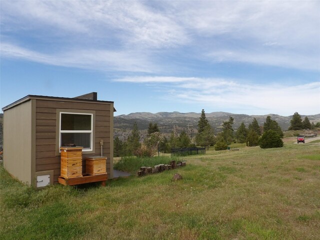 exterior space featuring a mountain view
