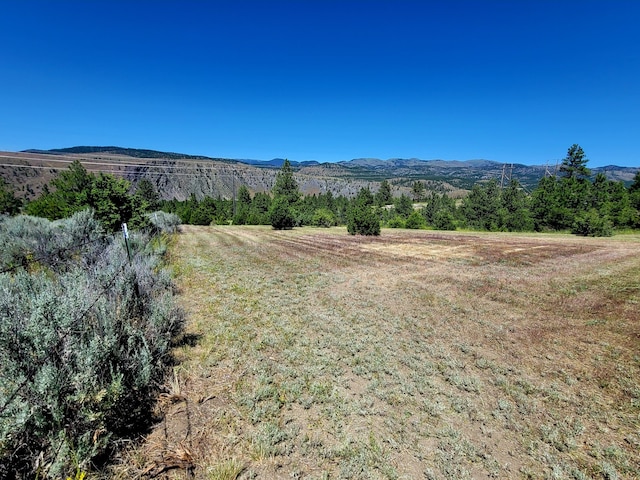 view of mountain feature with a rural view