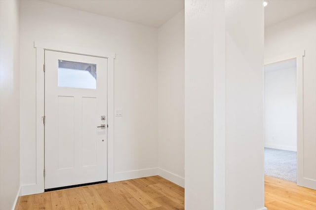 foyer with hardwood / wood-style flooring