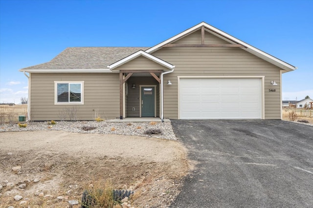 ranch-style home with a garage