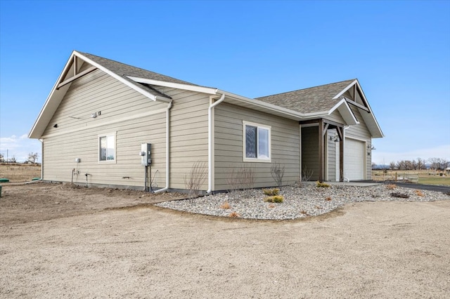 view of home's exterior with a garage