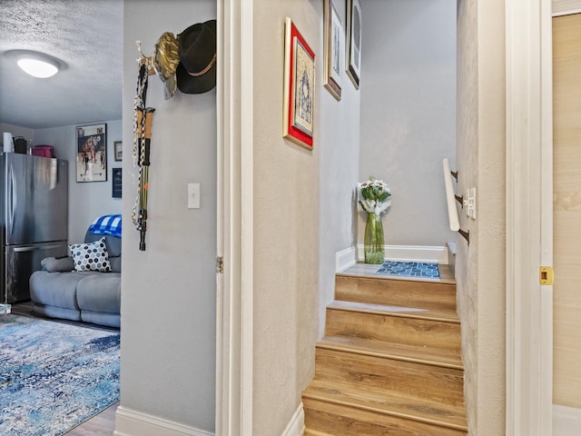 1915 E Broadway St, Missoula, MT 59802 - stairs with baseboards and wood finished floors