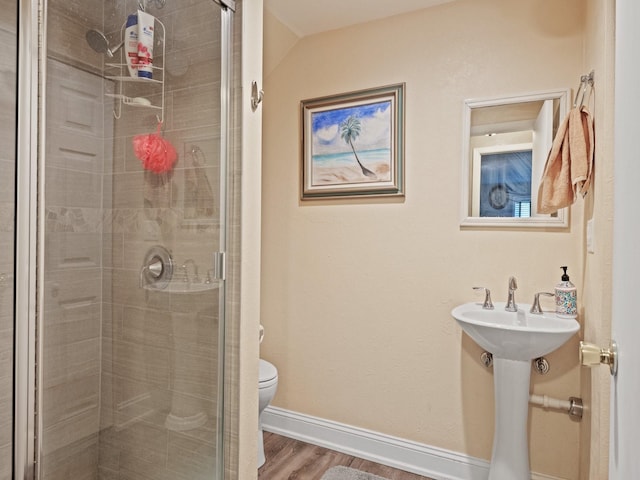 1915 E Broadway St, Missoula, MT 59802 - full bathroom with toilet, baseboards, wood finished floors, and a stall shower