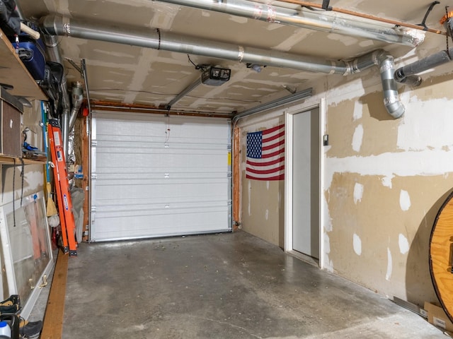 1915 E Broadway St, Missoula, MT 59802 - garage featuring a garage door opener