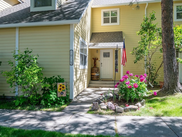 1915 E Broadway St, Missoula, MT 59802 - view of exterior entry featuring roof with shingles