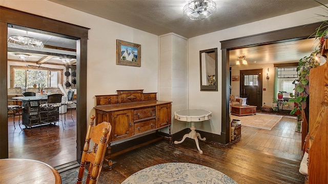 hall with dark hardwood / wood-style flooring