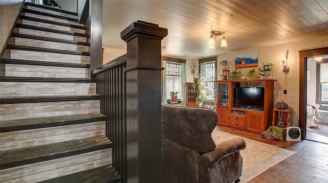 living room featuring wood ceiling and hardwood / wood-style floors