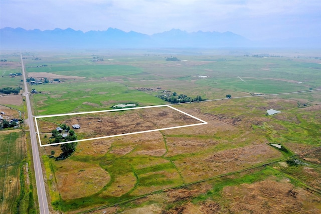 birds eye view of property featuring a rural view