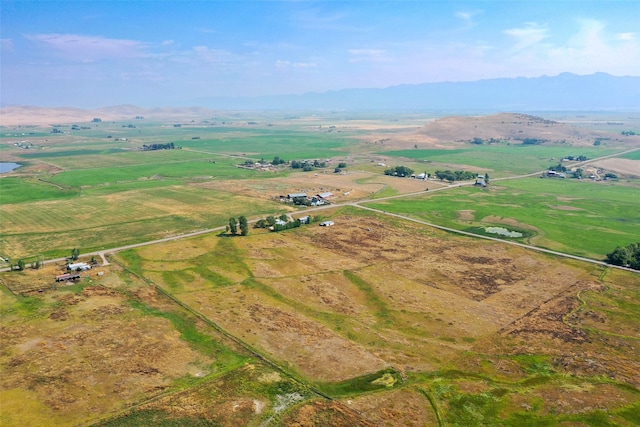 aerial view featuring a mountain view and a rural view