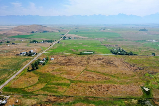 bird's eye view with a mountain view and a rural view