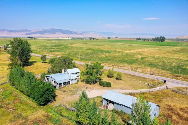 aerial view with a mountain view and a rural view