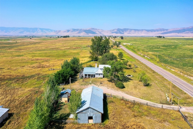 bird's eye view with a rural view and a mountain view