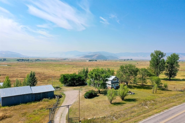 mountain view featuring a rural view