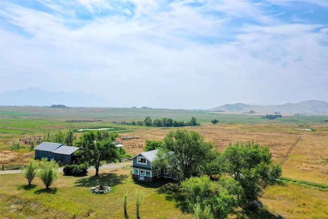 aerial view featuring a mountain view and a rural view