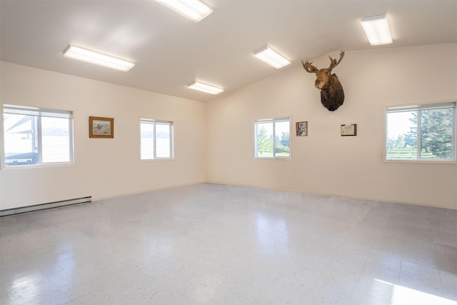 33953 Fox Rd, Polson, MT 59860 - empty room with healthy amount of natural light, tile patterned floors, and baseboard heating