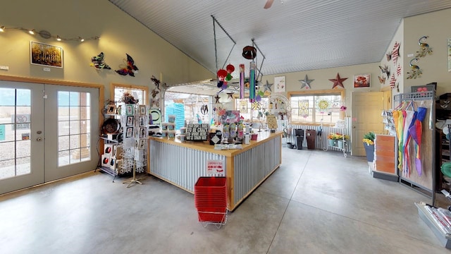33953 Fox Rd, Polson, MT 59860 - kitchen with concrete floors, french doors, and high vaulted ceiling