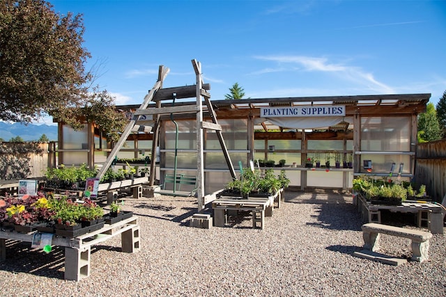 33953 Fox Rd, Polson, MT 59860 - view of home's community featuring an exterior structure, a vegetable garden, and an outdoor structure