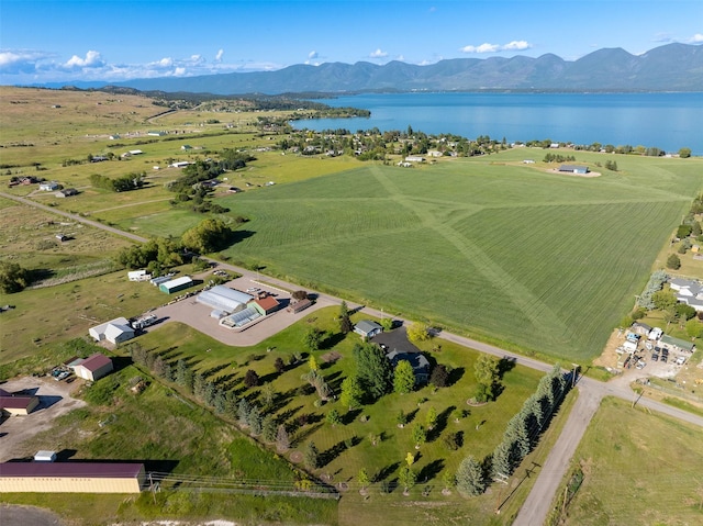 33953 Fox Rd, Polson, MT 59860 - aerial view of property and surrounding area featuring a water and mountain view and rural landscape