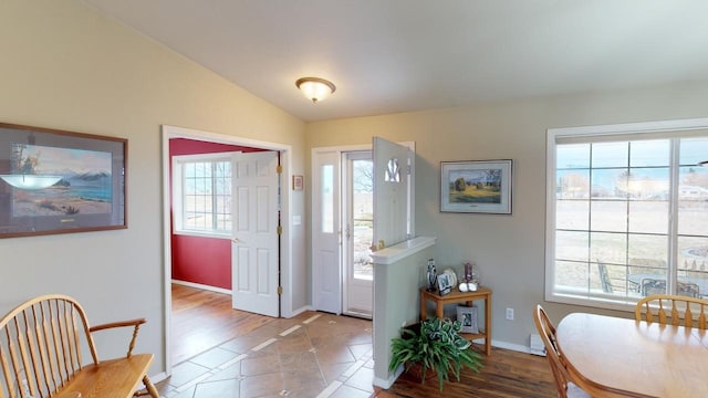 33953 Fox Rd, Polson, MT 59860 - foyer featuring lofted ceiling and wood finished floors