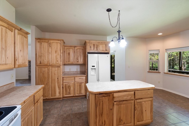 kitchen with a center island, light brown cabinets, white appliances, hanging light fixtures, and a chandelier