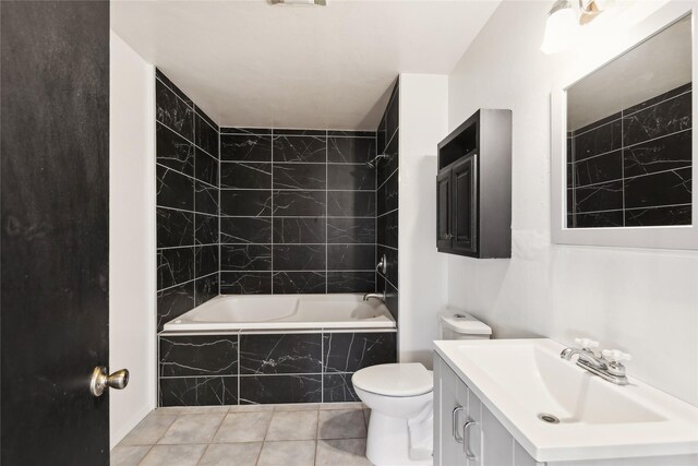 full bathroom with vanity, toilet, tile patterned floors, and tiled shower / bath