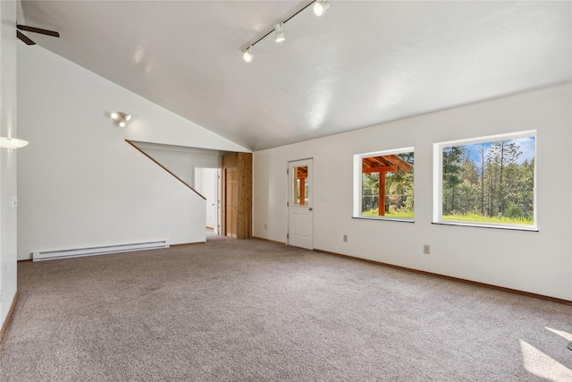 8100 US Highway 2 W, Marion, MT 59925 - spare room with a baseboard radiator, lofted ceiling, carpet, track lighting, and a ceiling fan