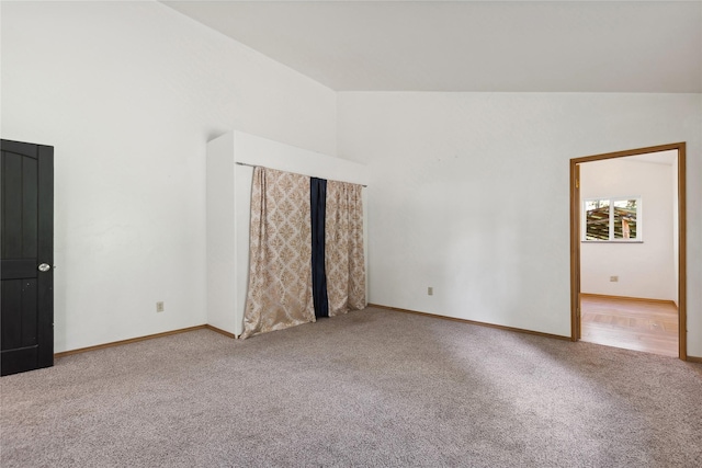 8100 US Highway 2 W, Marion, MT 59925 - spare room with carpet floors and high vaulted ceiling