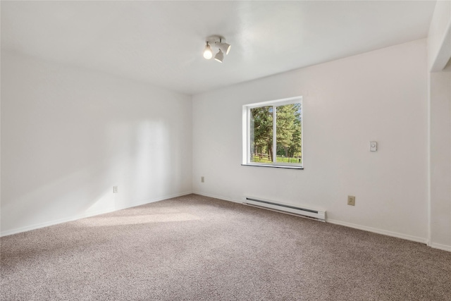 8100 US Highway 2 W, Marion, MT 59925 - unfurnished room with baseboard heating and carpet floors