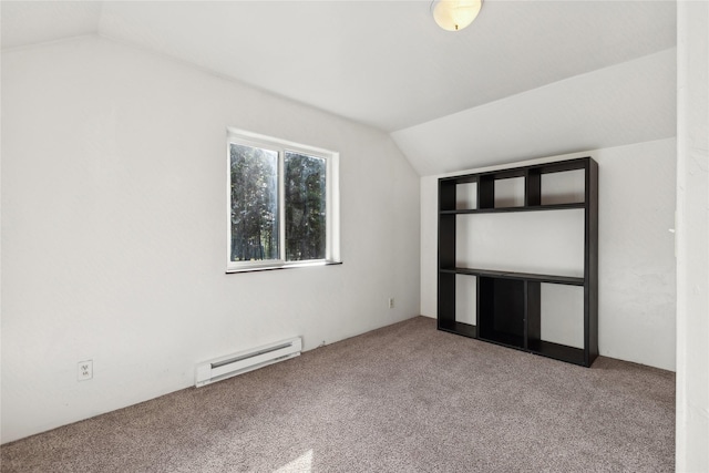 8100 US Highway 2 W, Marion, MT 59925 - bonus room featuring a baseboard radiator, lofted ceiling, and carpet floors