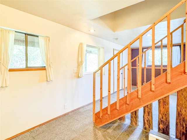 8100 US Highway 2 W, Marion, MT 59925 - staircase with baseboards and recessed lighting