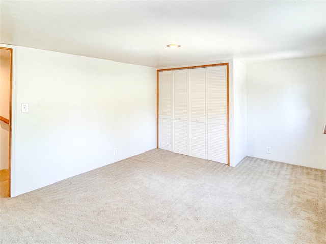 8100 US Highway 2 W, Marion, MT 59925 - unfurnished bedroom featuring carpet flooring and a closet