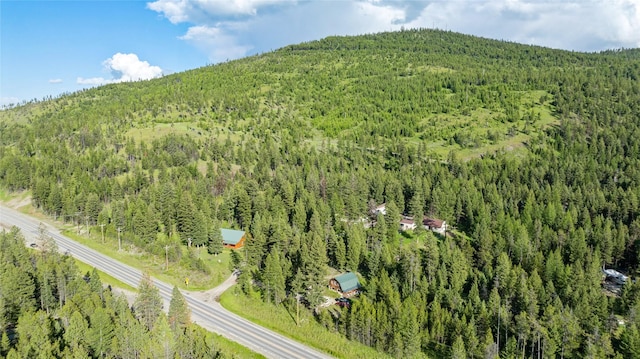 8100 US Highway 2 W, Marion, MT 59925 - aerial view of property and surrounding area with a forest