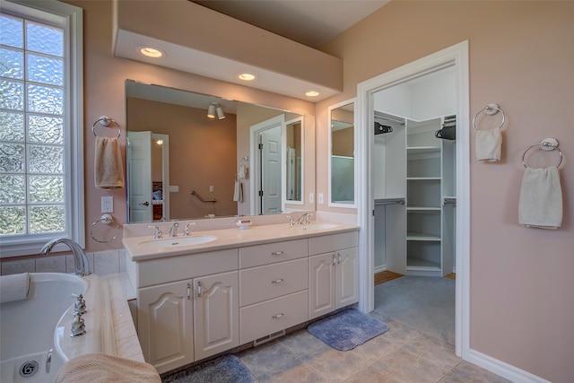 bathroom featuring tile patterned floors and vanity