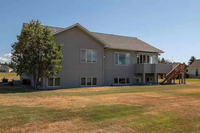 back of house with a yard