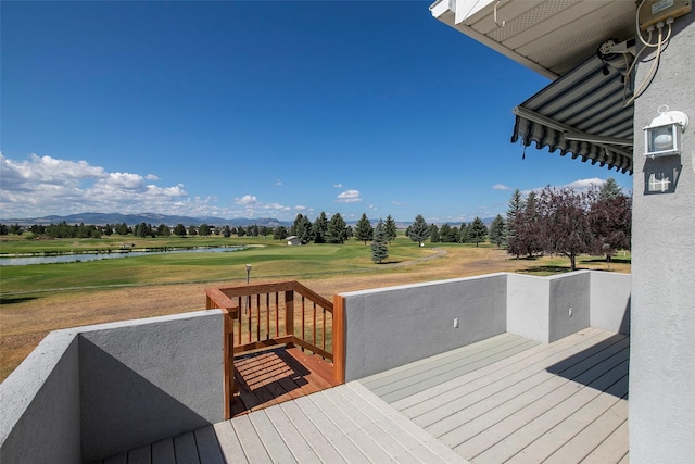 deck featuring a water view