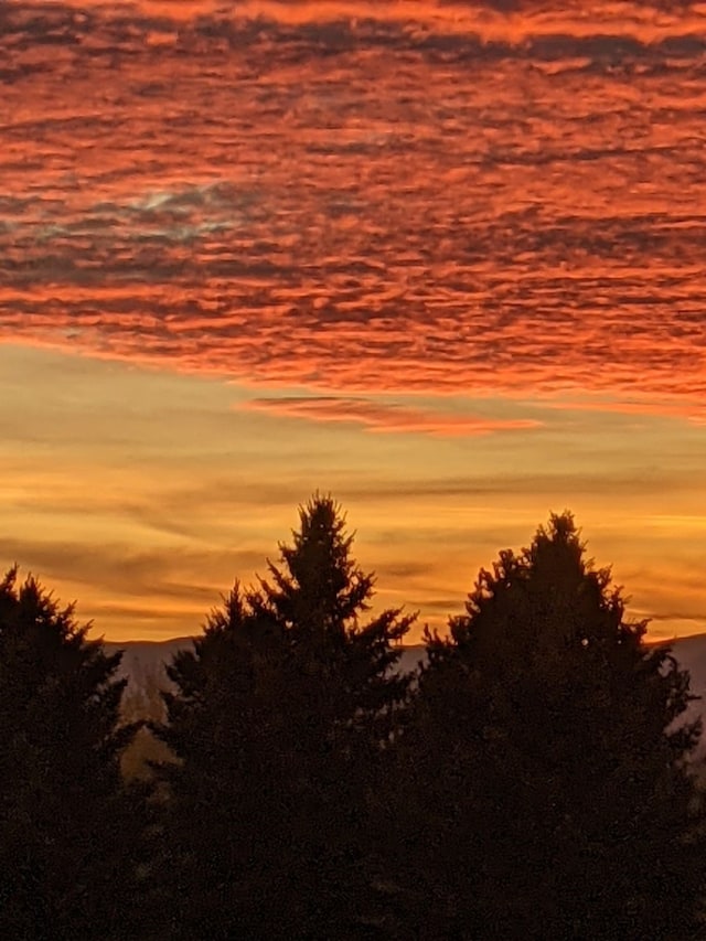 nature at dusk featuring a mountain view