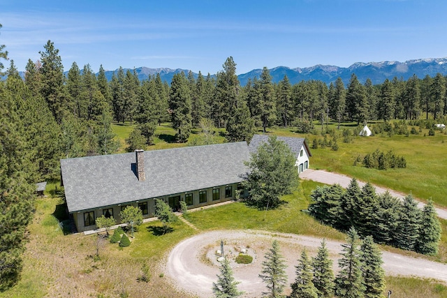 birds eye view of property featuring a mountain view