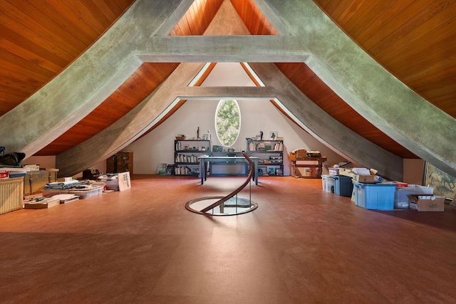 bonus room with lofted ceiling and wood ceiling