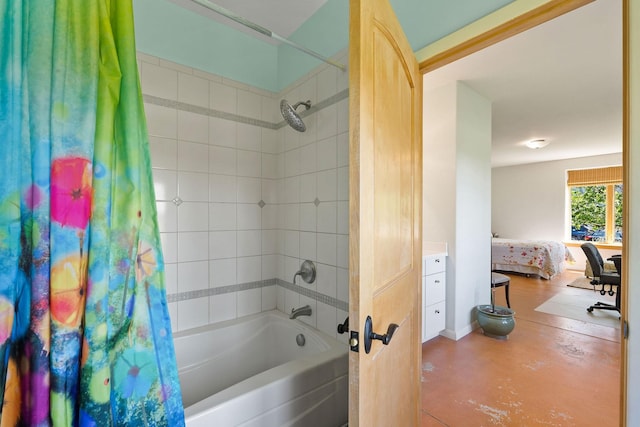 bathroom with shower / bath combo with shower curtain