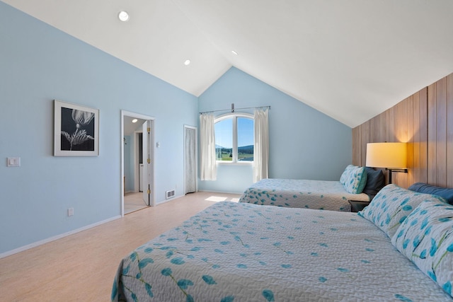 bedroom featuring lofted ceiling