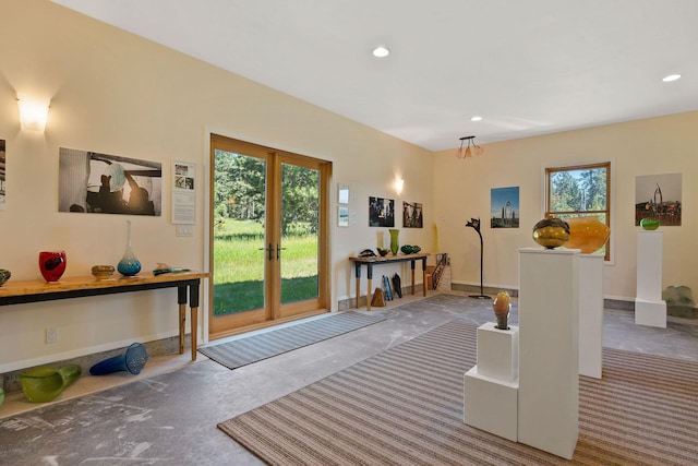 interior space with french doors and a healthy amount of sunlight