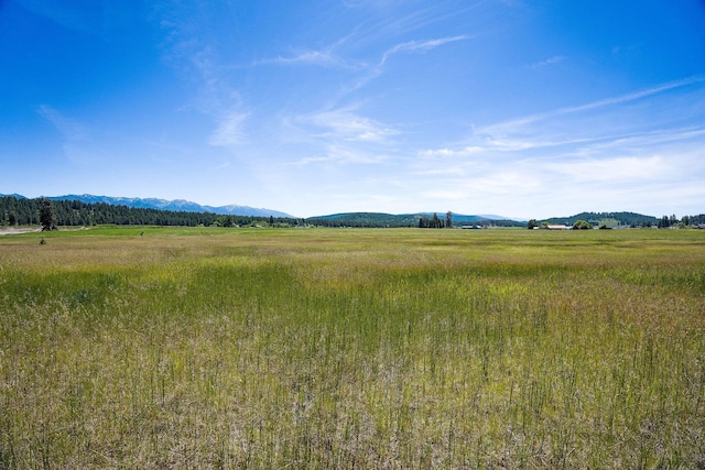 property view of mountains with a rural view