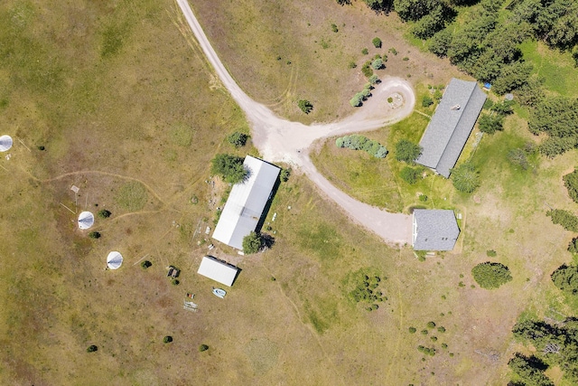 birds eye view of property featuring a rural view