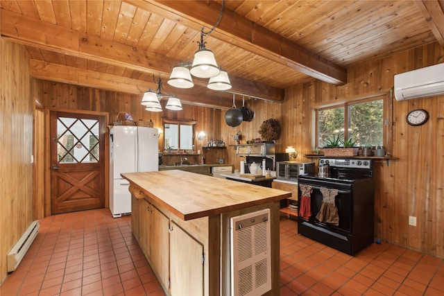 kitchen with wood counters, freestanding refrigerator, black / electric stove, a baseboard heating unit, and pendant lighting