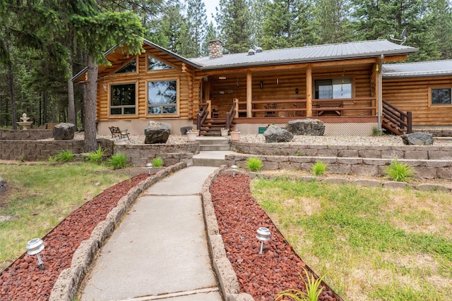 view of log-style house